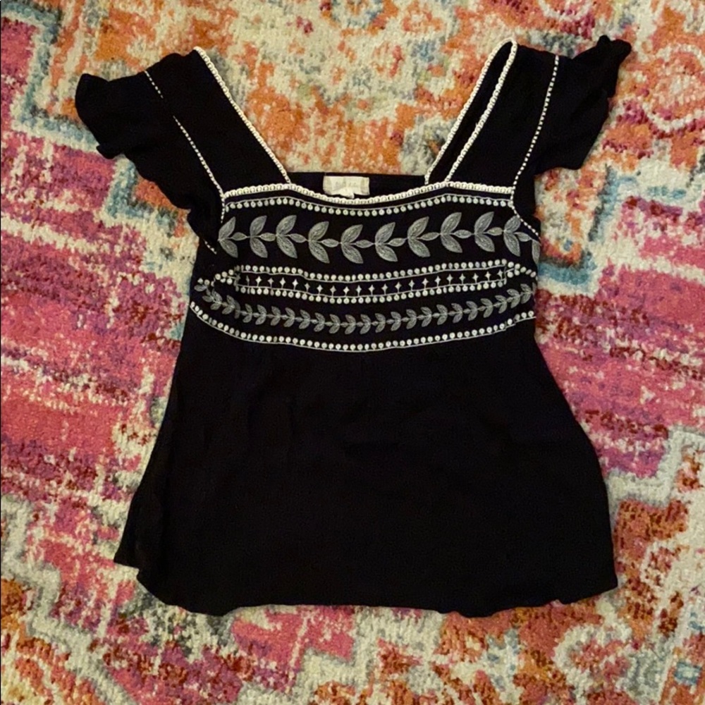 Black top with white embroidery